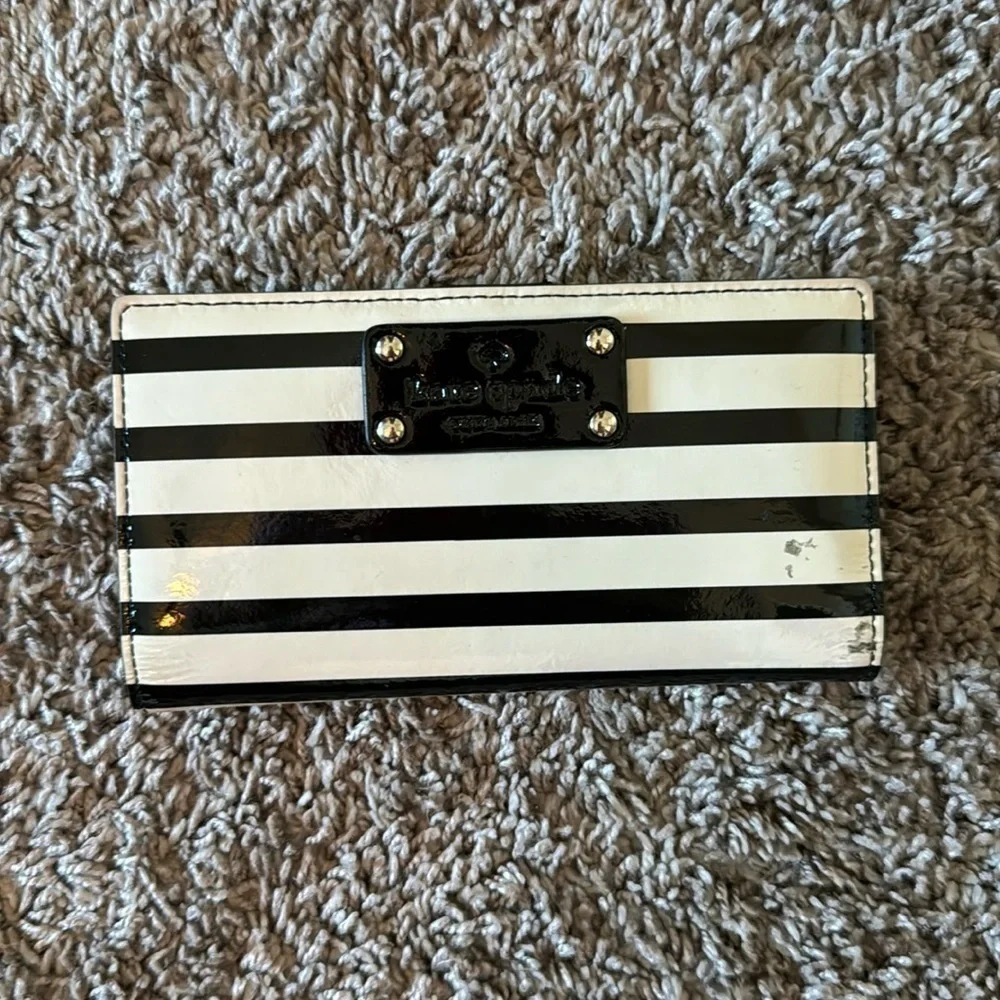 Striped black and white, shiny Kate Spade card wallet